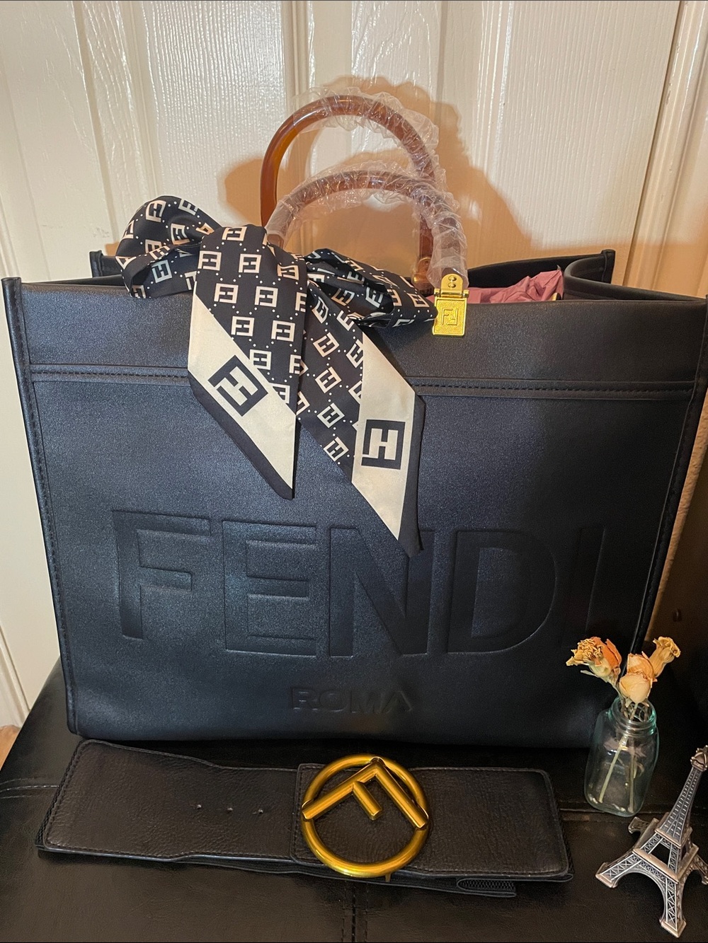 Fashion Black Embossed Logo Tote with Monogram Scarf and Gold Accent.